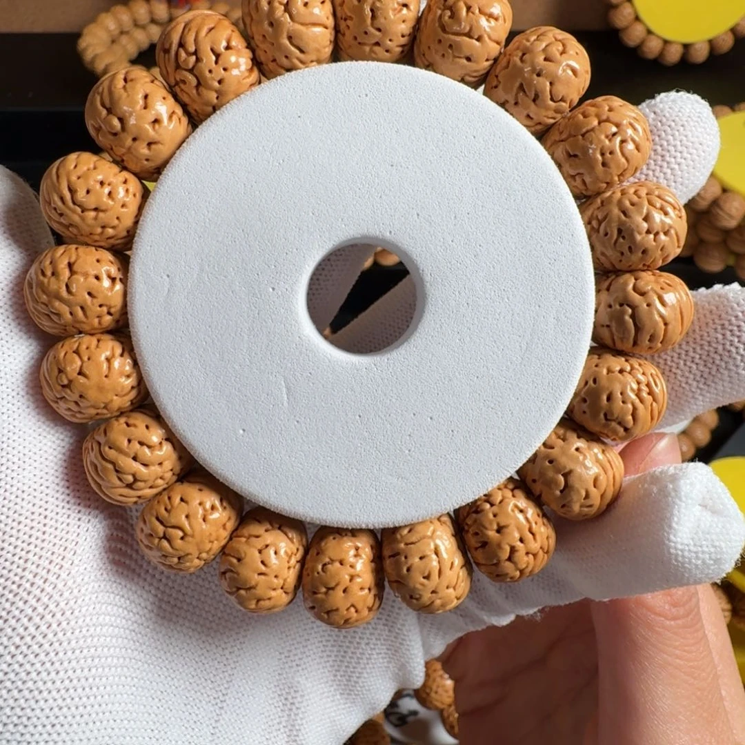 M***.吊坠桃核16纽扣8+脐