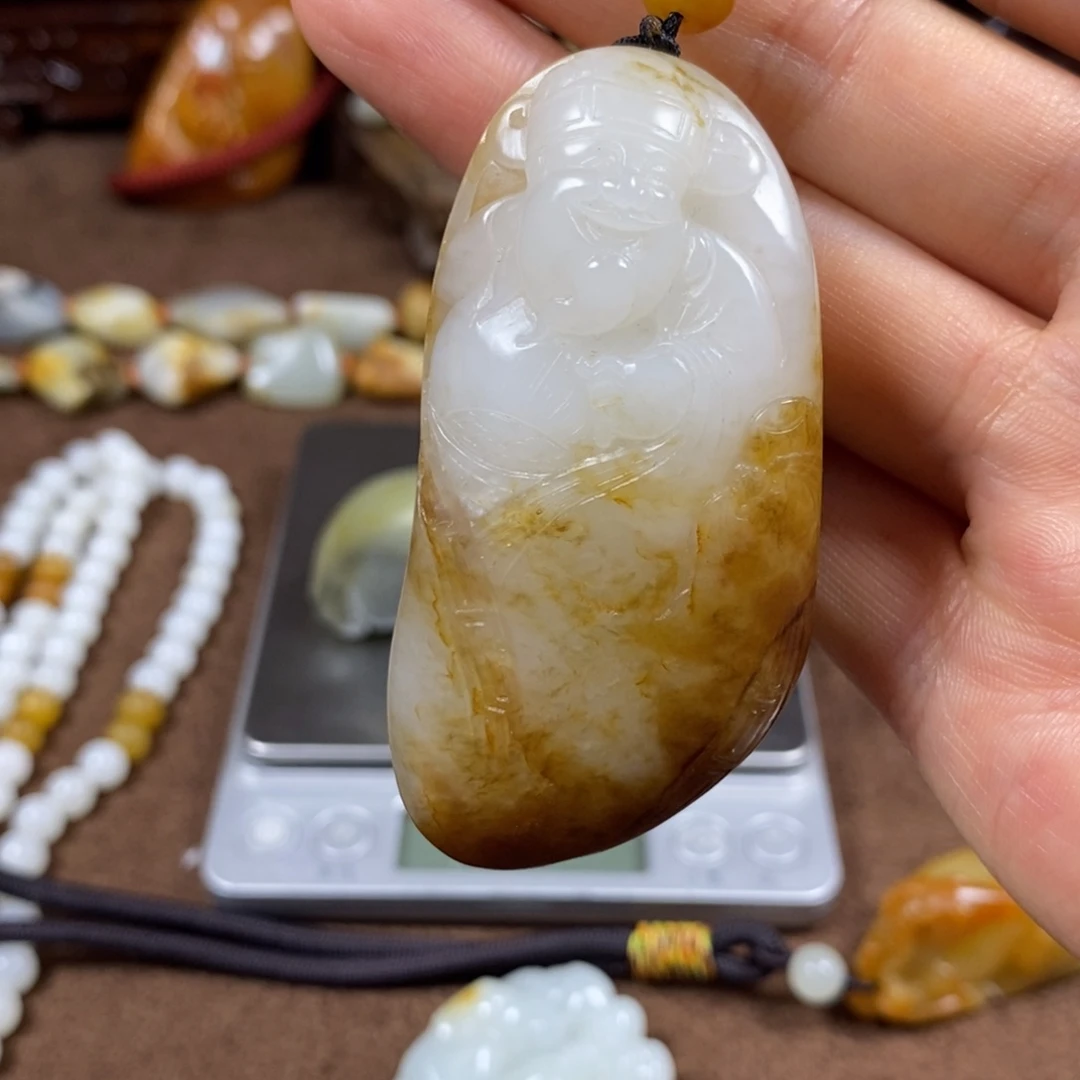 扬***行和田玉未镶嵌把件