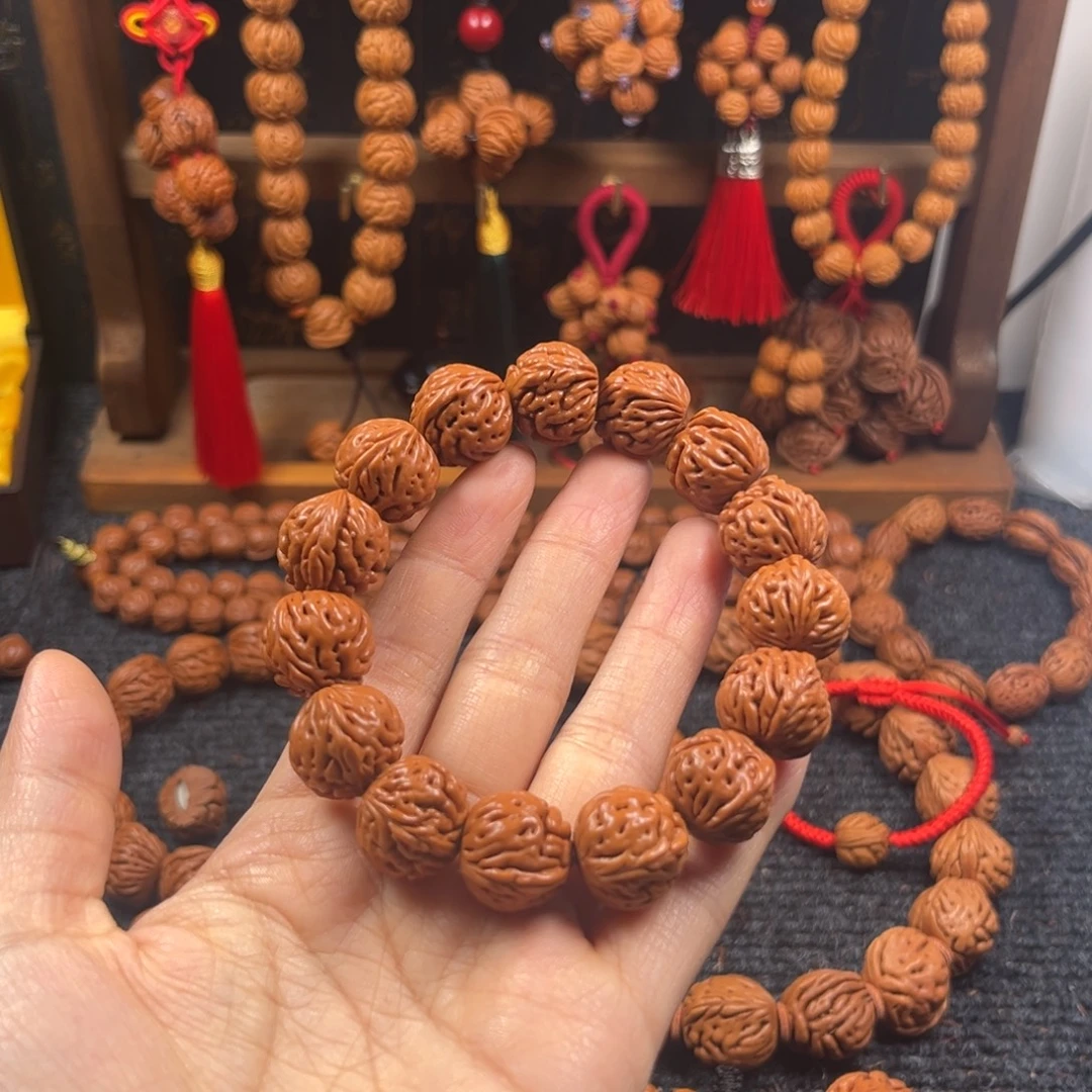 康***锐吊坠桃核桃枭手串L2