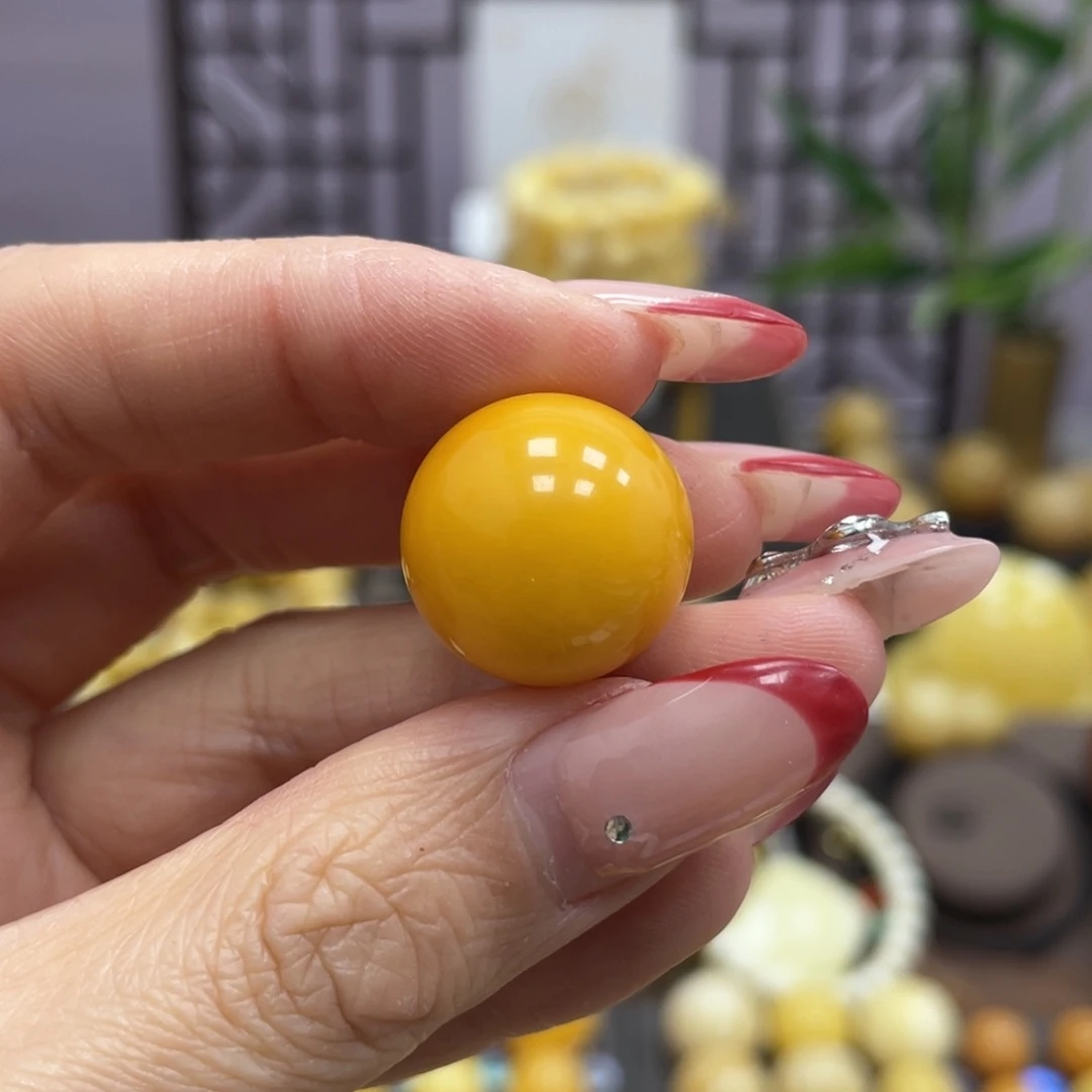 蜜蜡裸石未镶嵌张*生17.3mm圆珠