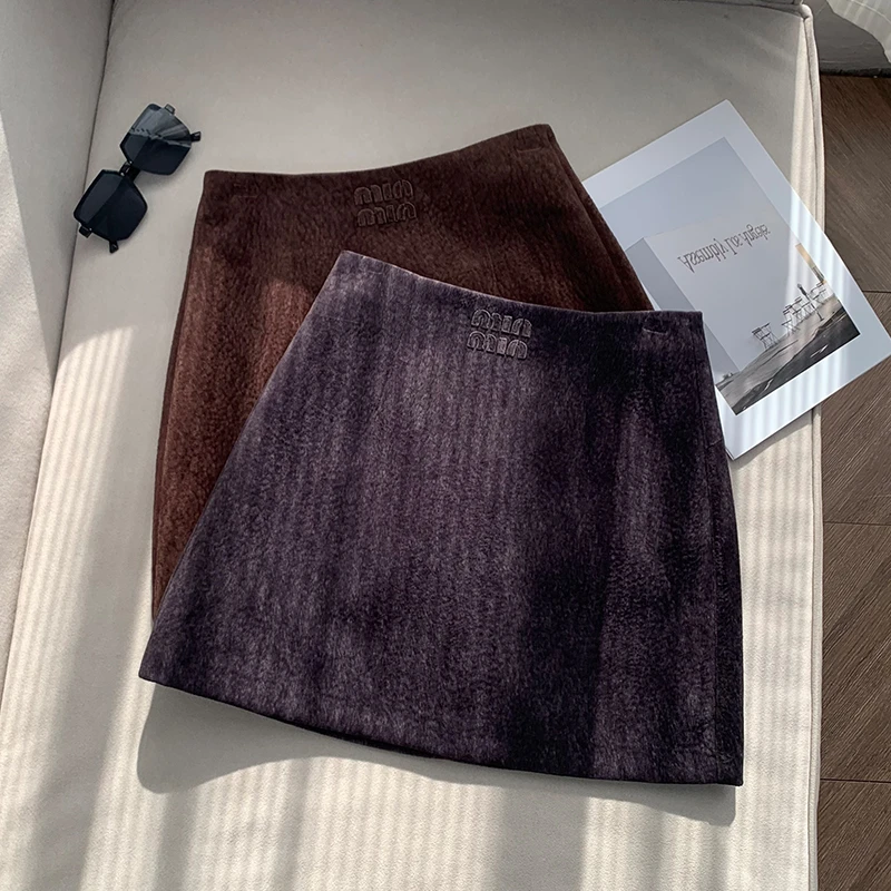 【南油子宸】复古刺绣纯色A字短裙修身显瘦时尚气质半身裙804005