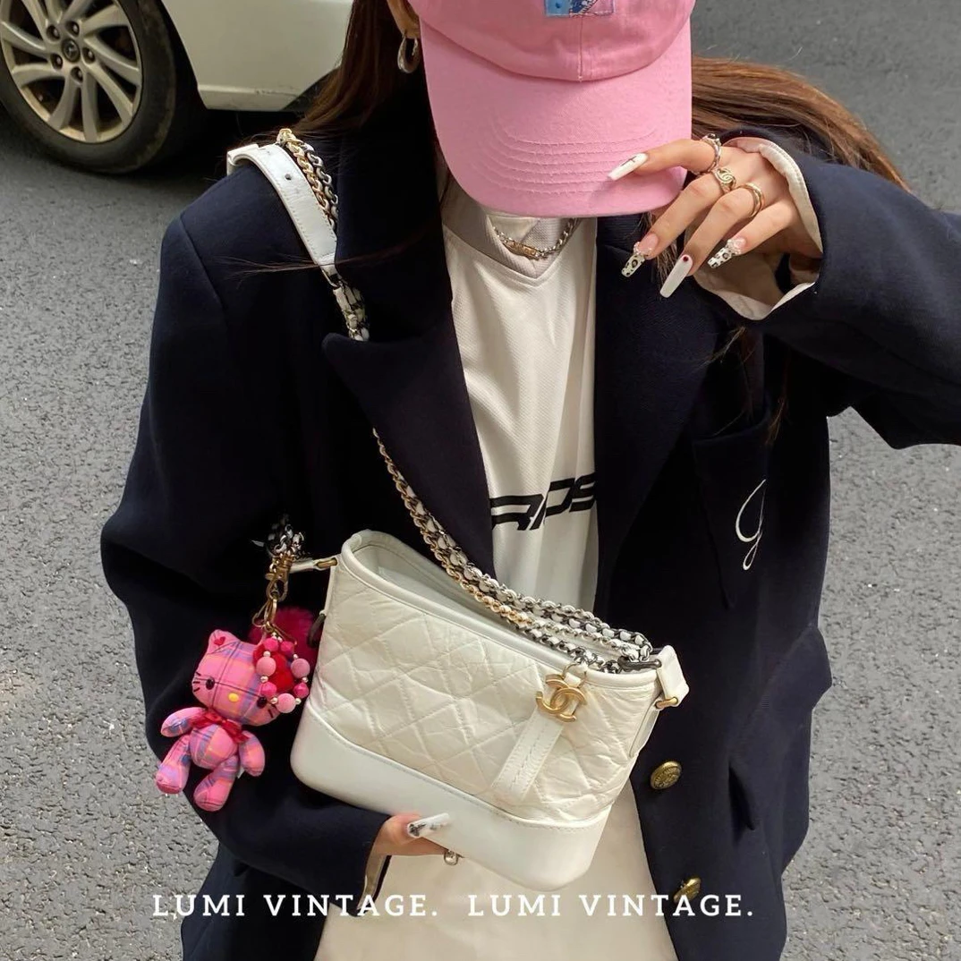 95新 Chanel/香奈儿 白色牛皮小号流浪斜挎包95391045
