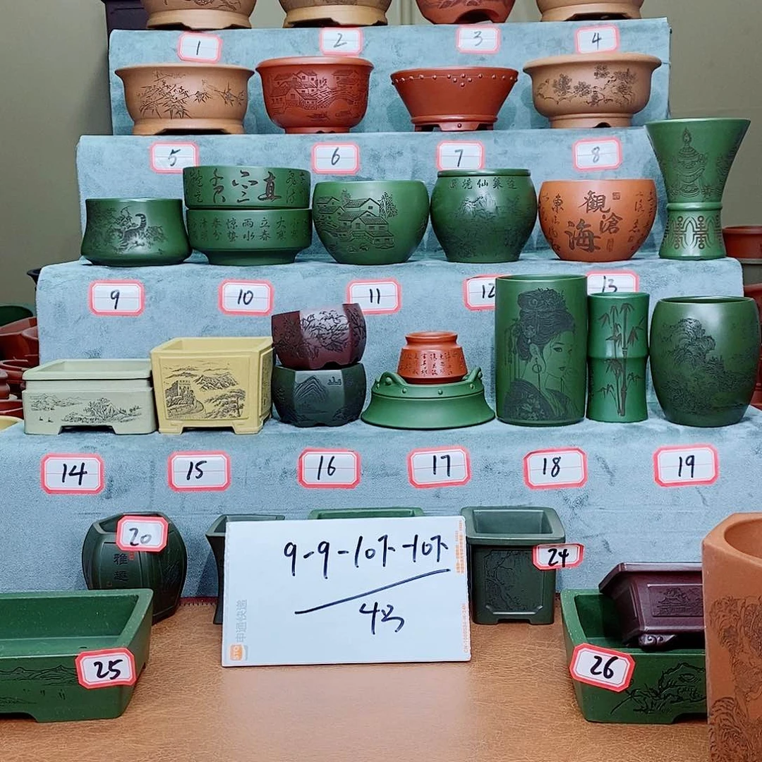 紫砂花盆繁**旧你是不可能