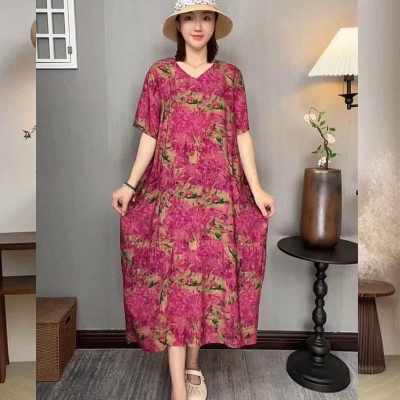 夏季轻职风连衣裙粉花显手大码裙大码遮肚中长款洋气连衣裙