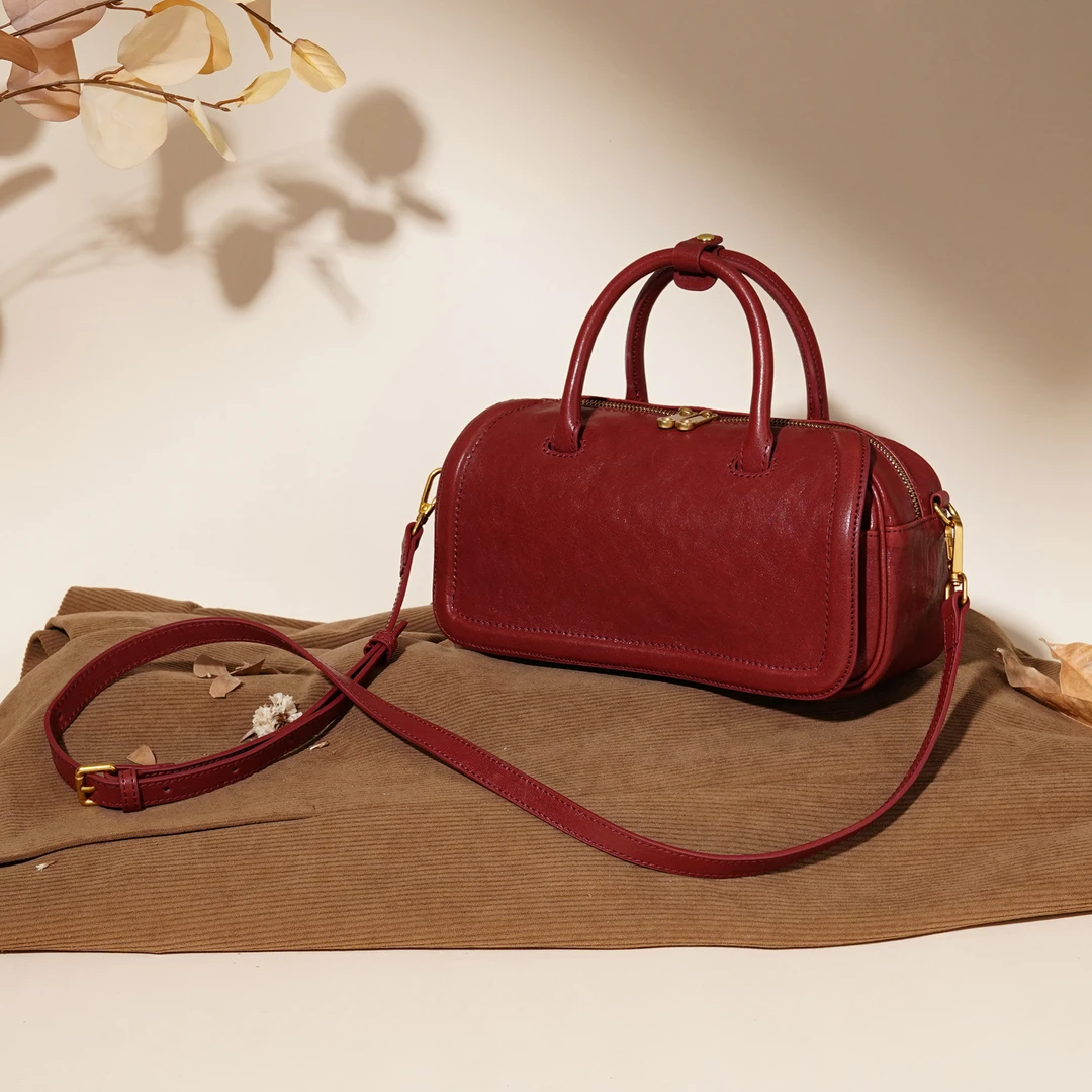 岩牛早秋新款复古保龄球包女时尚百搭肩包YN3654