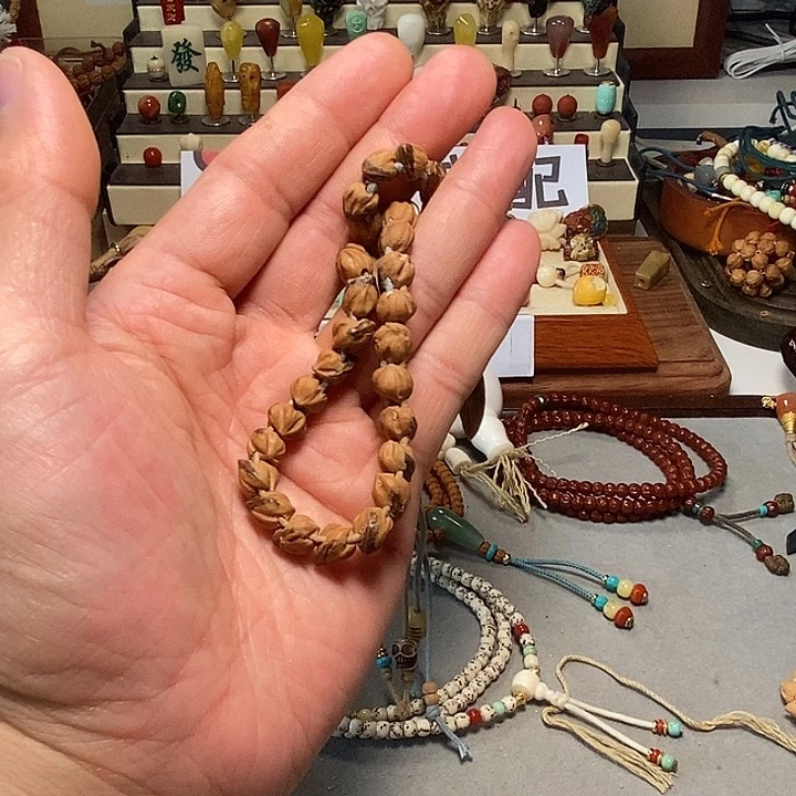 梵***语柏香籽/百香籽手串特价高油高密斜打手持素串