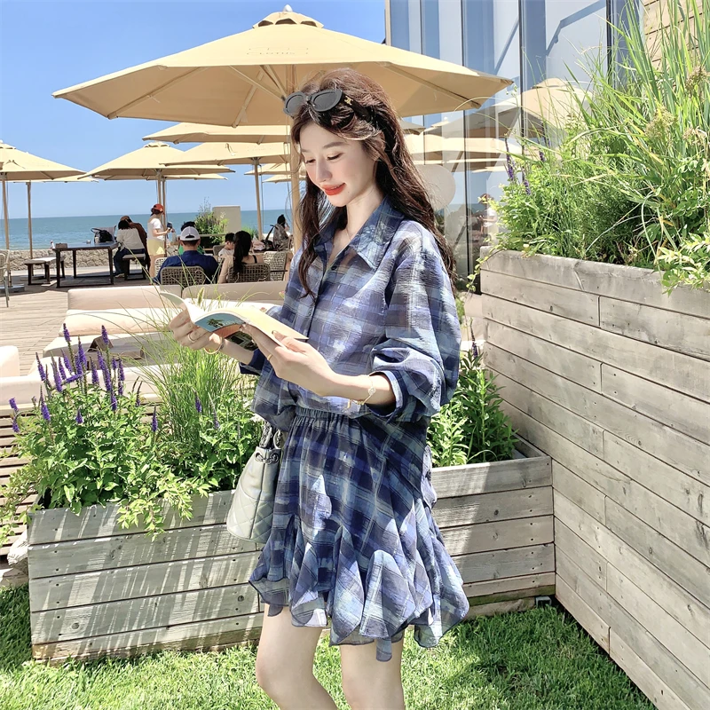 小众不撞款慵懒风套装女夏2025年新款蓝色长袖防晒衬衫短裙两件套