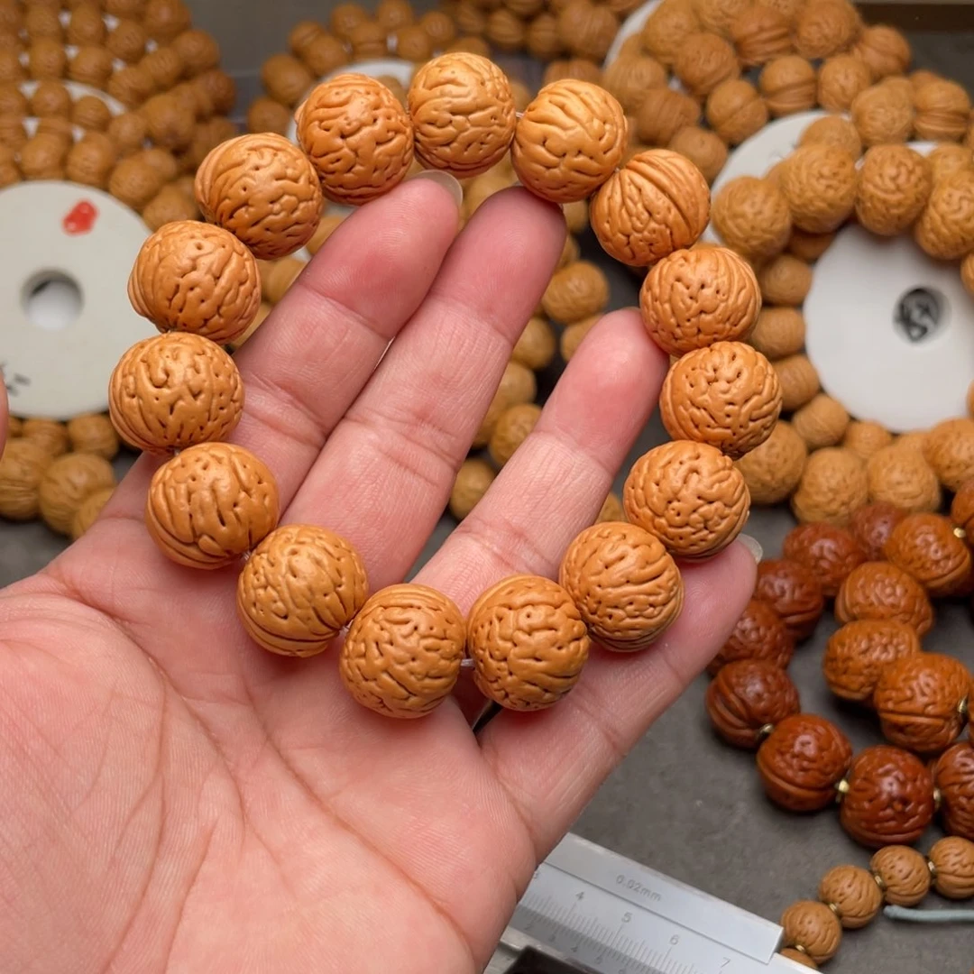 樂***中桃核手串肉纹元宝闪25