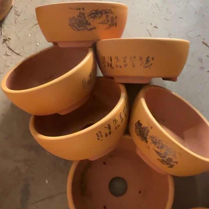 紫砂花盆100-6。