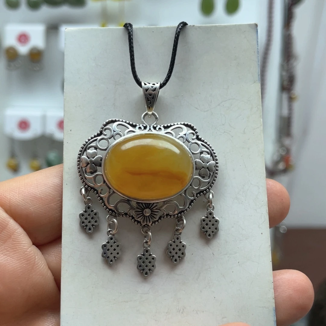 美***滋未镶嵌蛇纹石玉吊坠