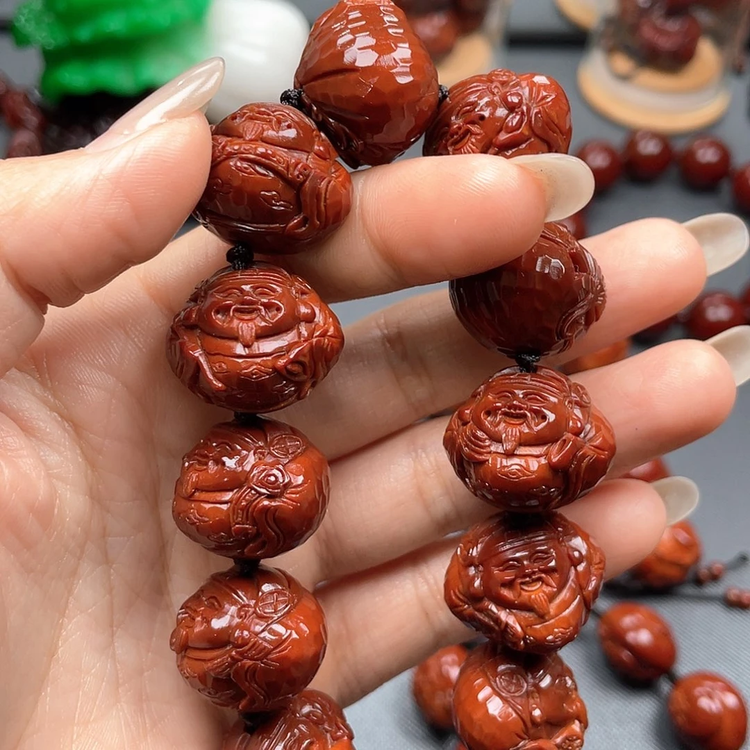 帅***容橄榄核手串财神手串