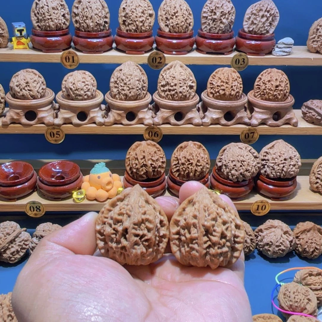 嘿***哈文玩核桃吊坠百兽纹文玩