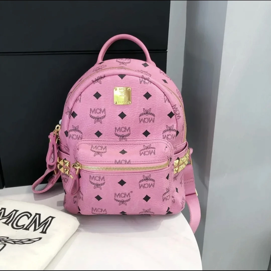 95新 MCM MCM粉色小号双肩包25090086-03