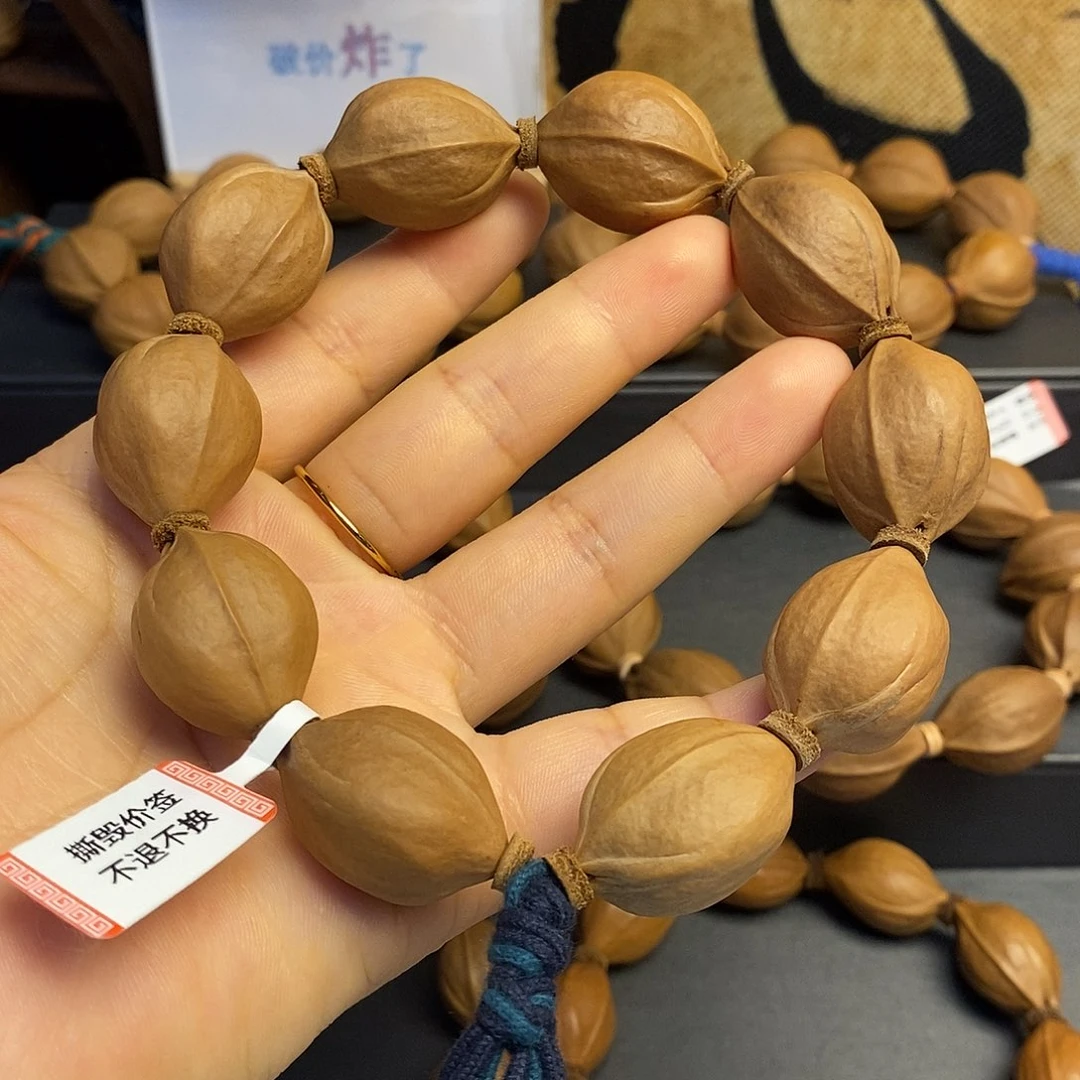 橄榄核手串/手链梅林铁核20/28左右（三花）