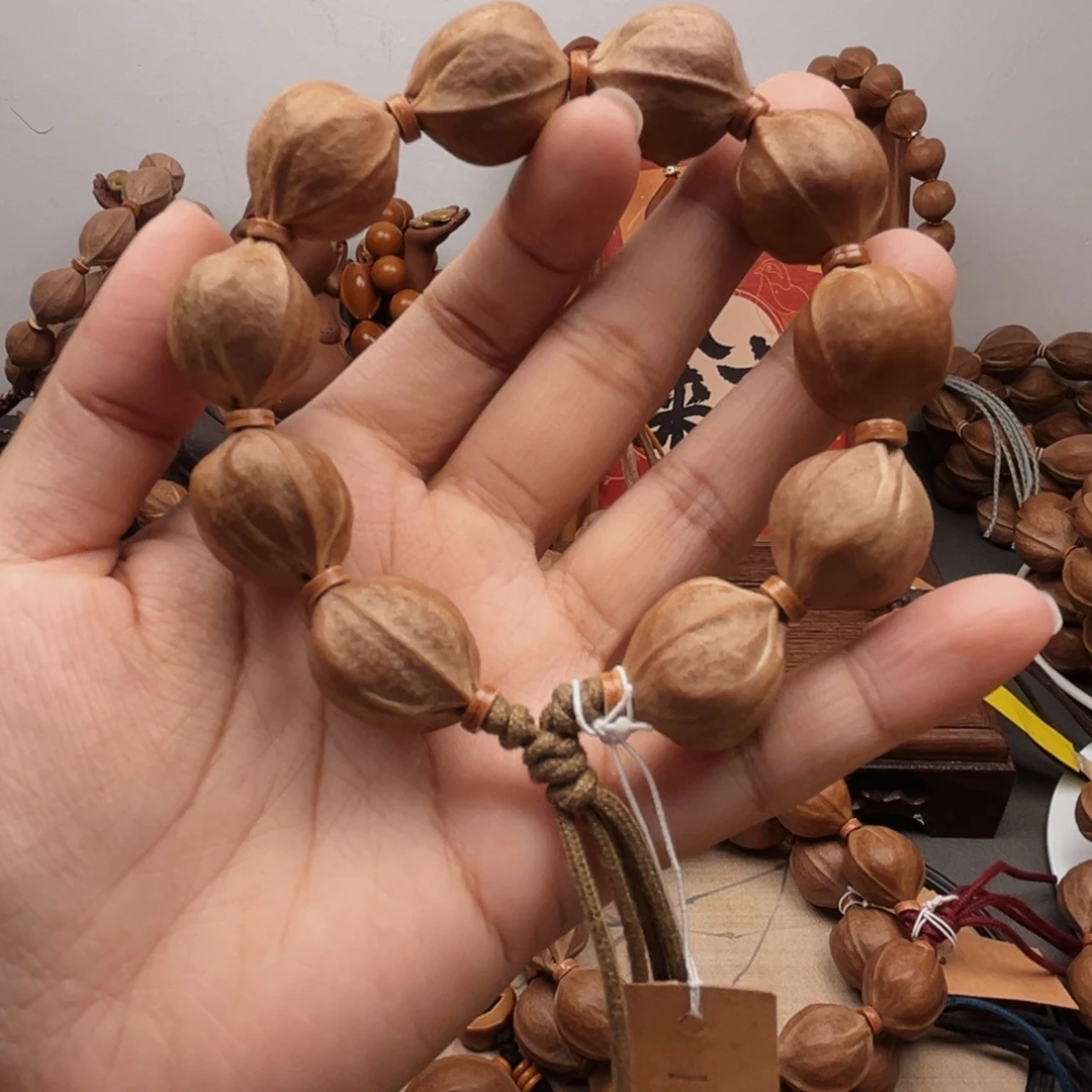 旷***塔手串橄榄核19.22梅林铁核