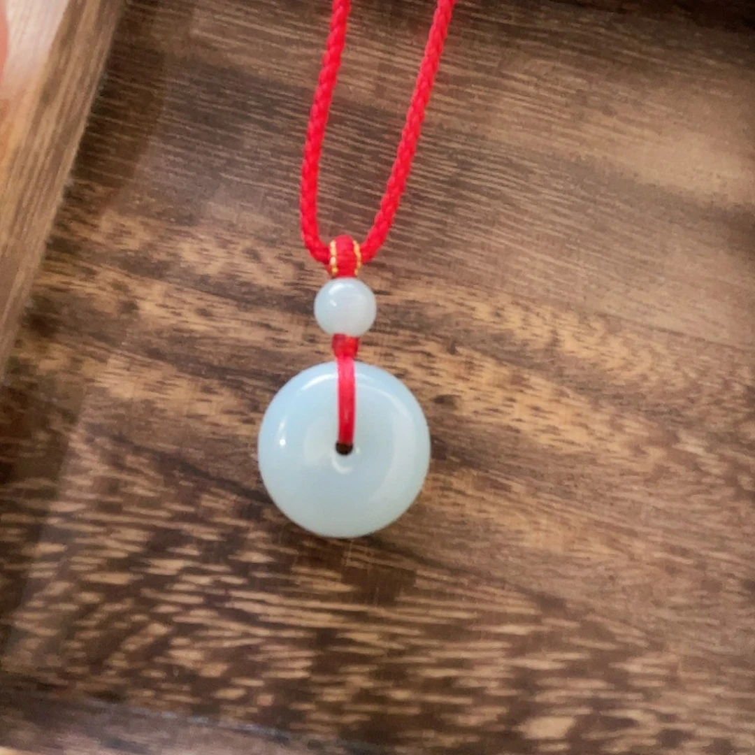 翡翠未镶嵌颈饰一**安