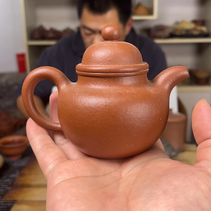 ╰***贴紫砂茶壶嫩时红铎球