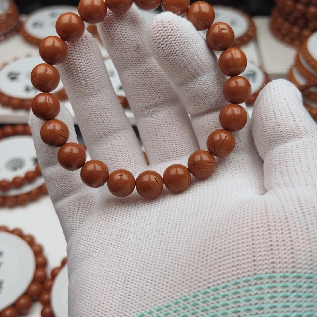 阿***龙桃核吊坠桃核手串