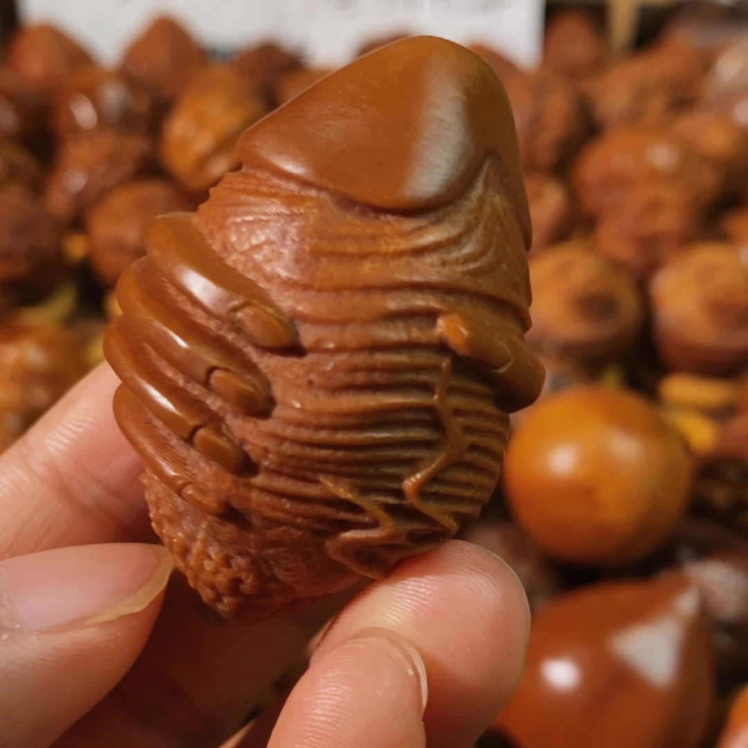 橄榄核把件大权在握