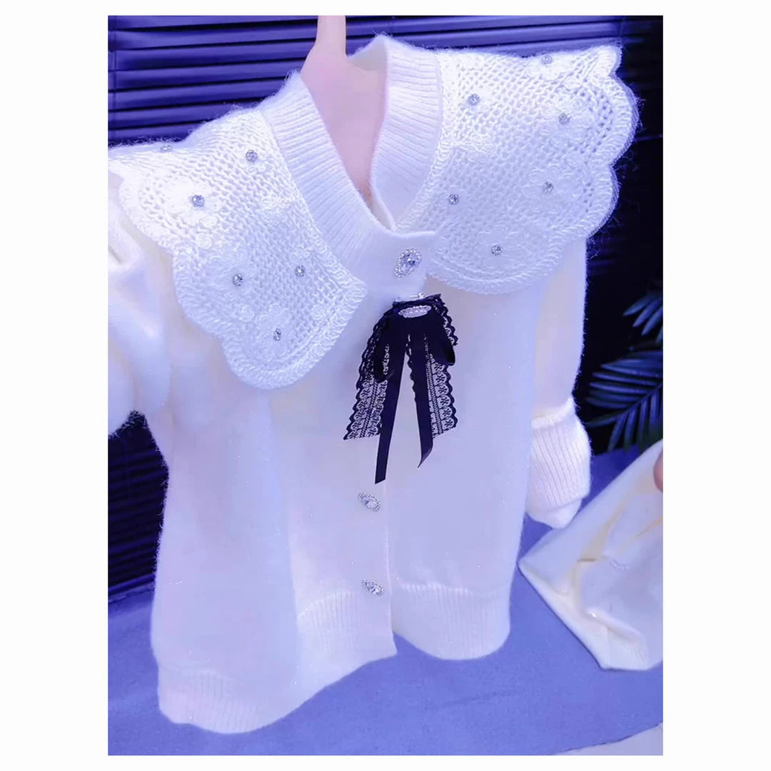 温柔减龄重工富家千金款白色上衣女2025冬蝴蝶结镶钻娃娃领针织衫