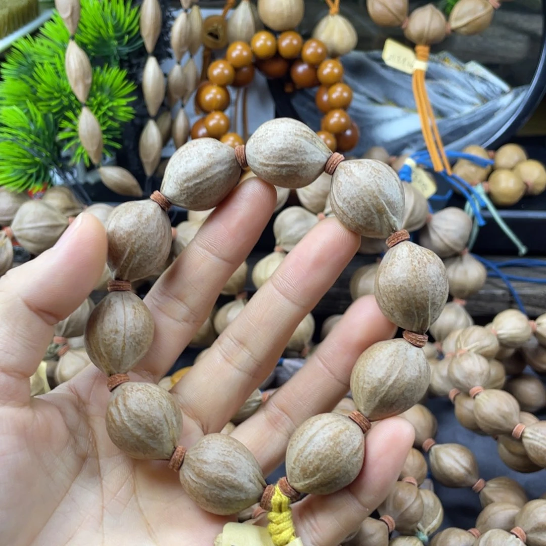 小****吊坠橄榄核20x26红核