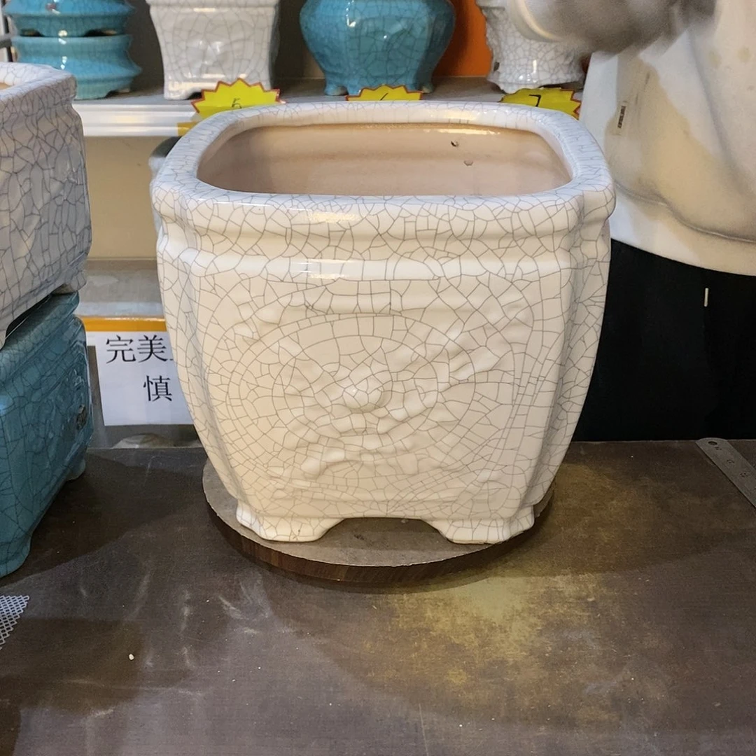 审**流微瑕花盆花盆里的