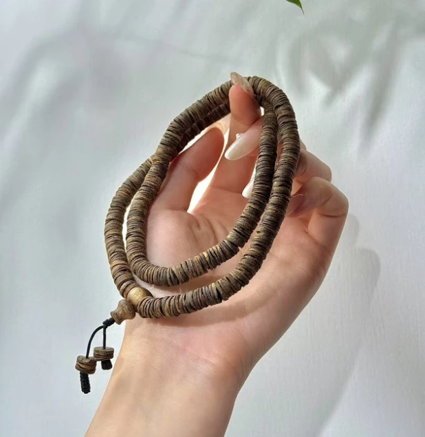 沉香7mm莺歌绿棋楠沉水片珠 手串 随型多圈