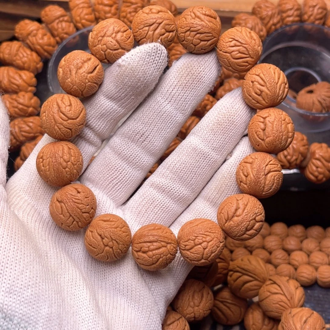 手串桃核金丝龙珠1.7