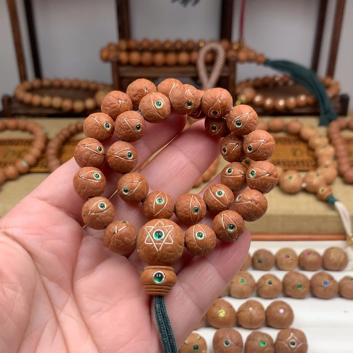 凤眼菩提吊坠手持