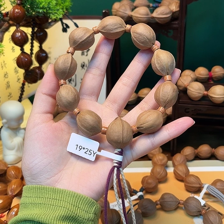 十***风橄榄核吊坠1925头货款梅林铁核