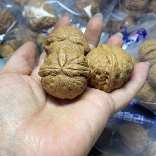 小***刚文玩核桃吊坠元宝异形58