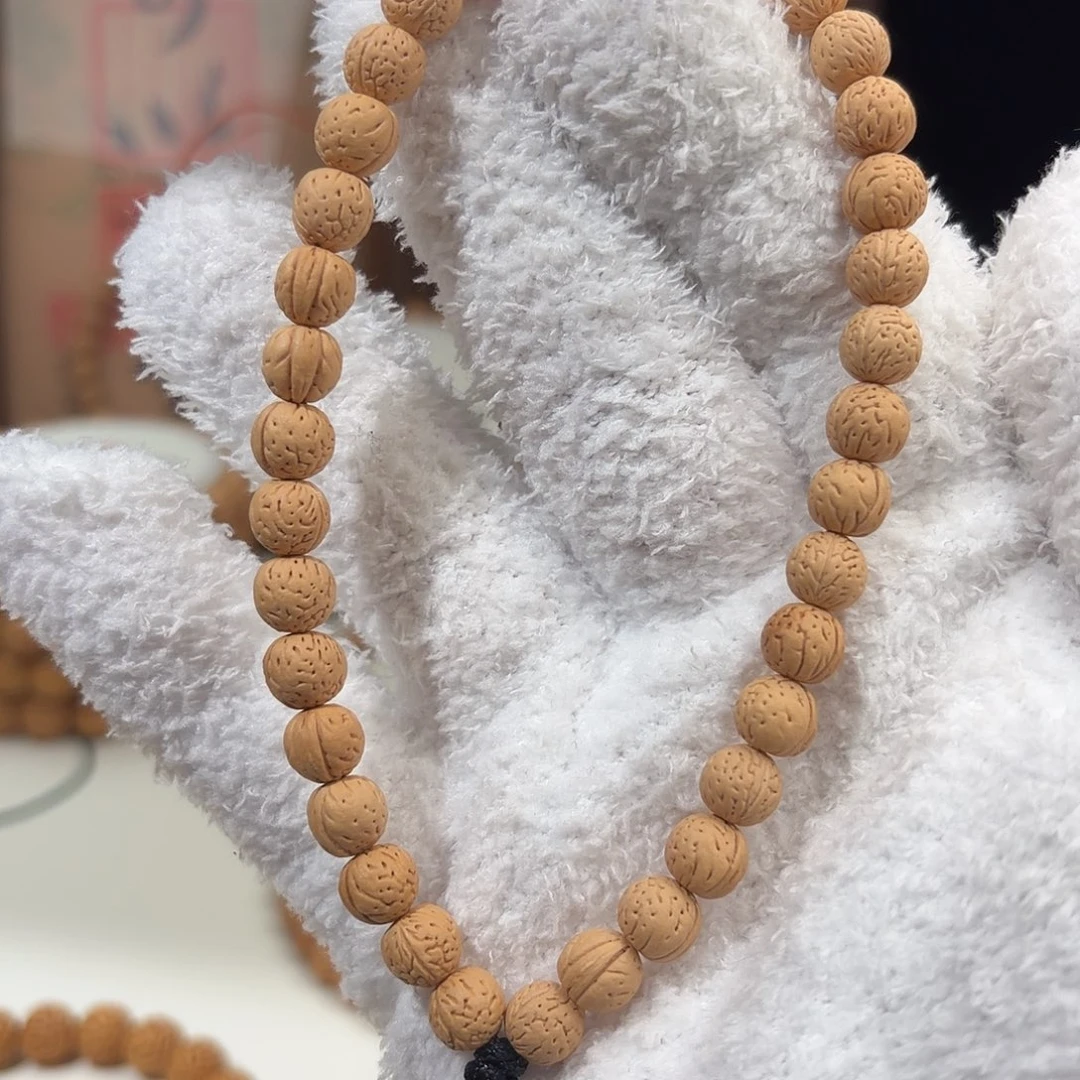 桃核手串0.7加「骄阳」野生桃核手持