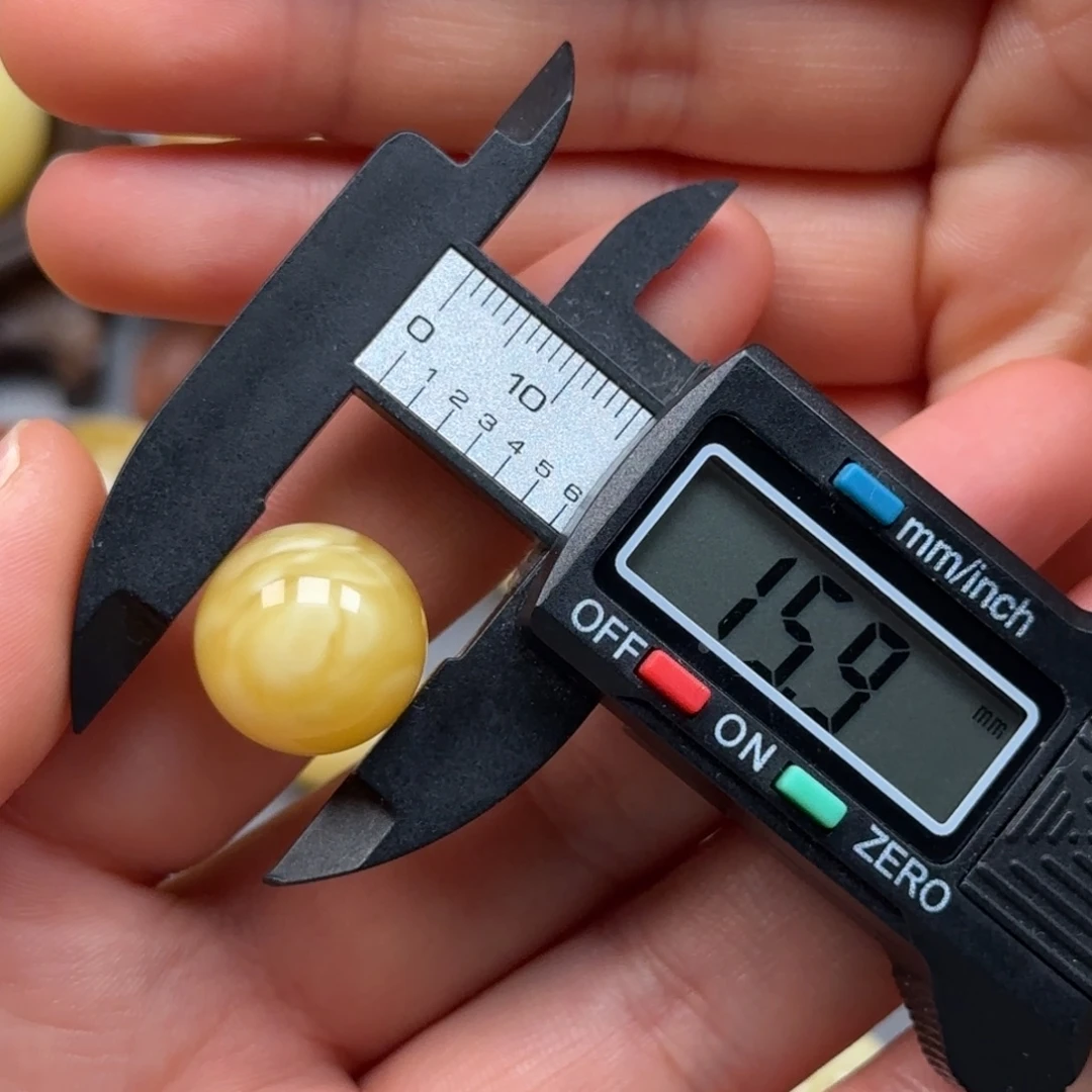 琥珀未镶嵌裸石白花金沙溶洞单珠
