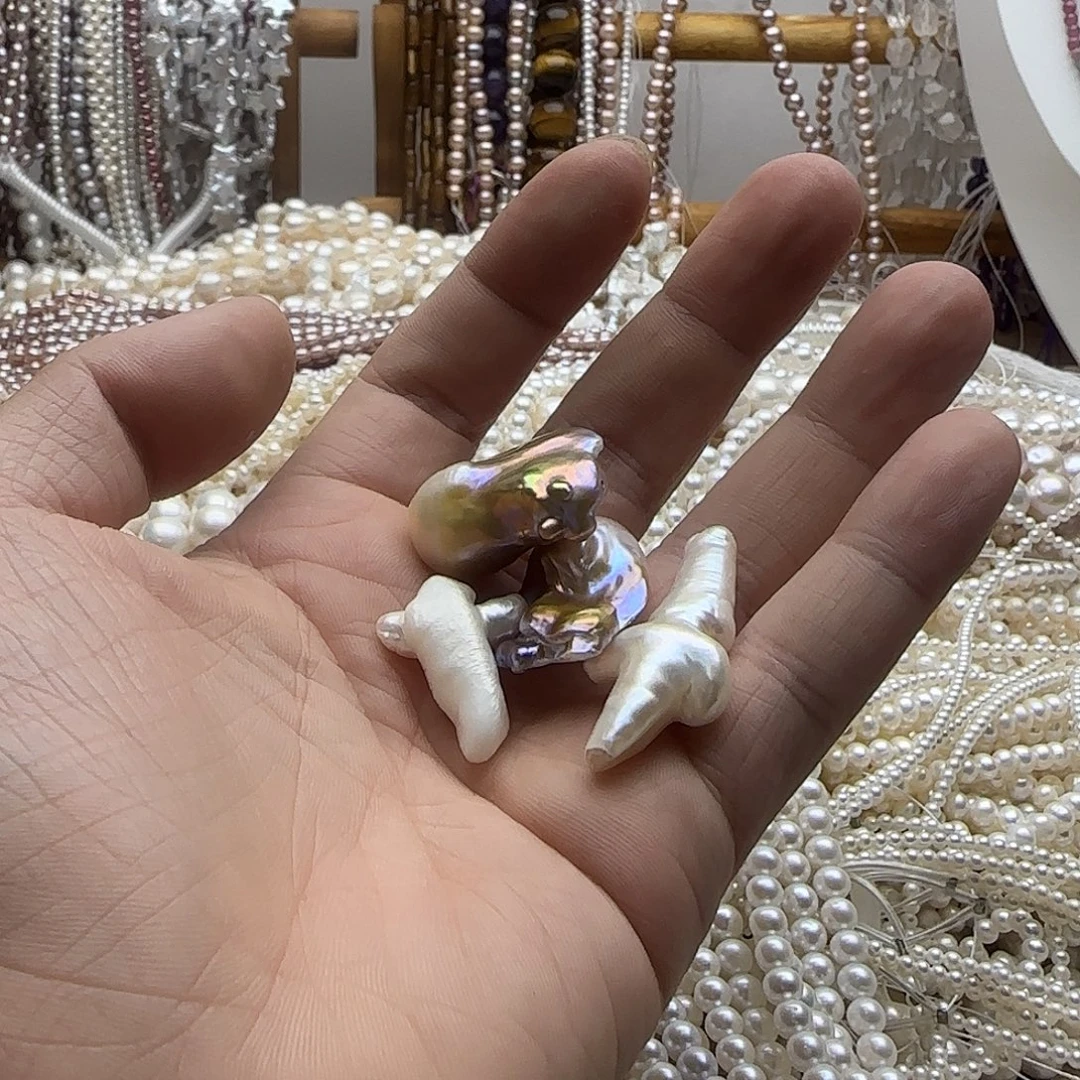 用***9未镶嵌半成品淡水珍珠2鱼尾