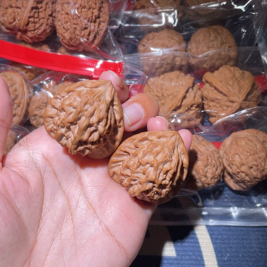 和***尘文玩核桃吊坠金三角39