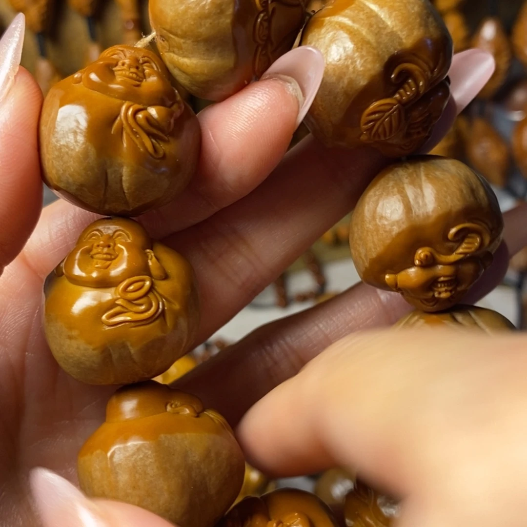 蓝***暴橄榄核手串/手链包衣大弥勒精品