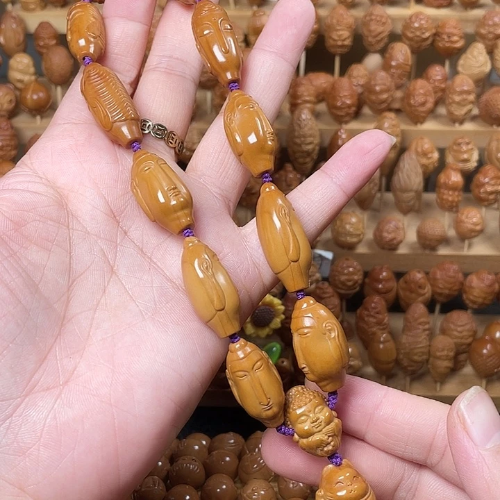 吊坠橄榄核长脸特价花皮手持不退不换