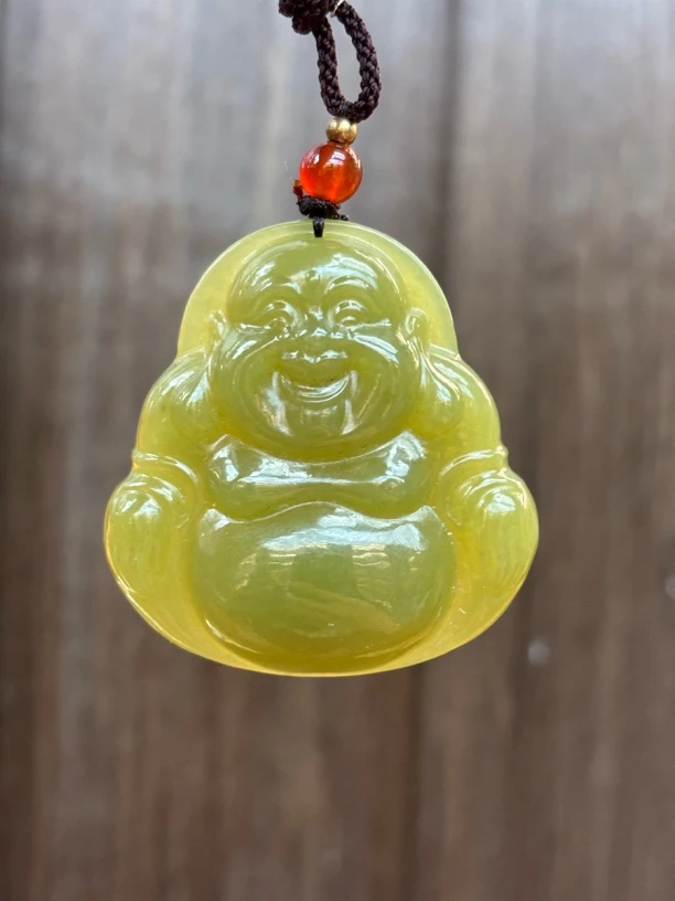 2334 和田玉黄口佛公规格约：45.6*43*9.5 多样性发其一