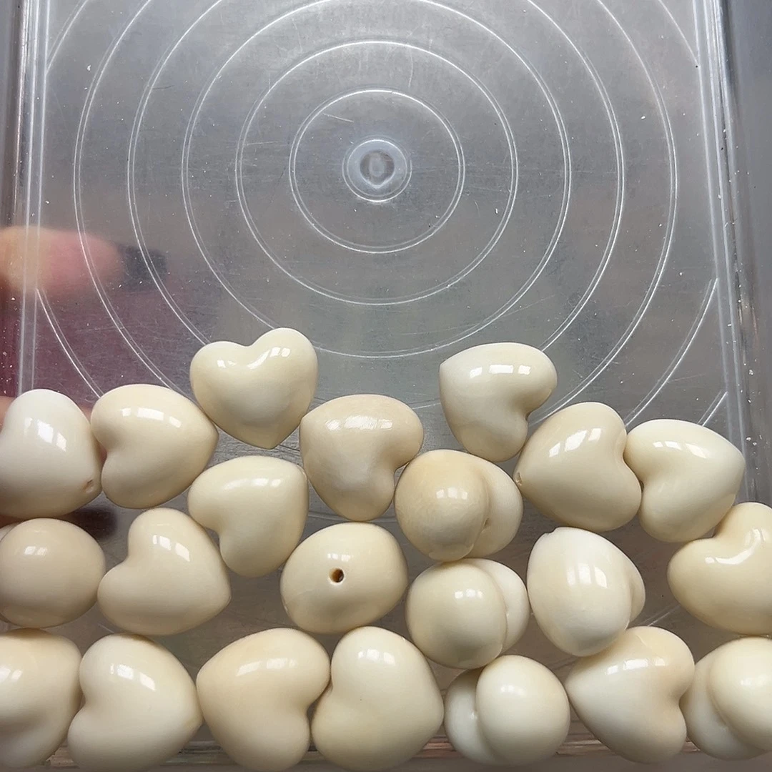 手串菩提根/象牙果瑕疵21➕上下孔白爱心11颗有裂