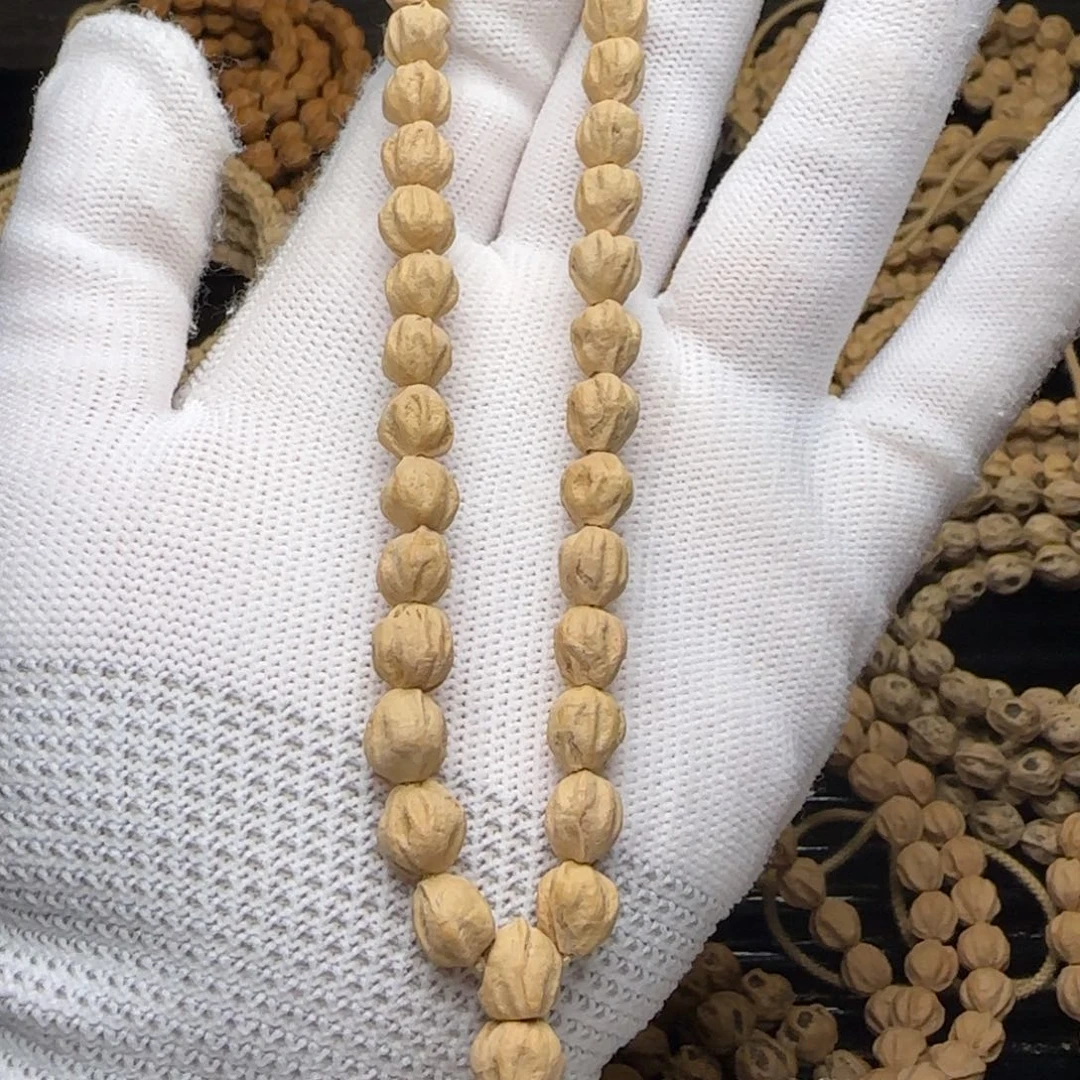 柏香籽/百香籽手串T****?