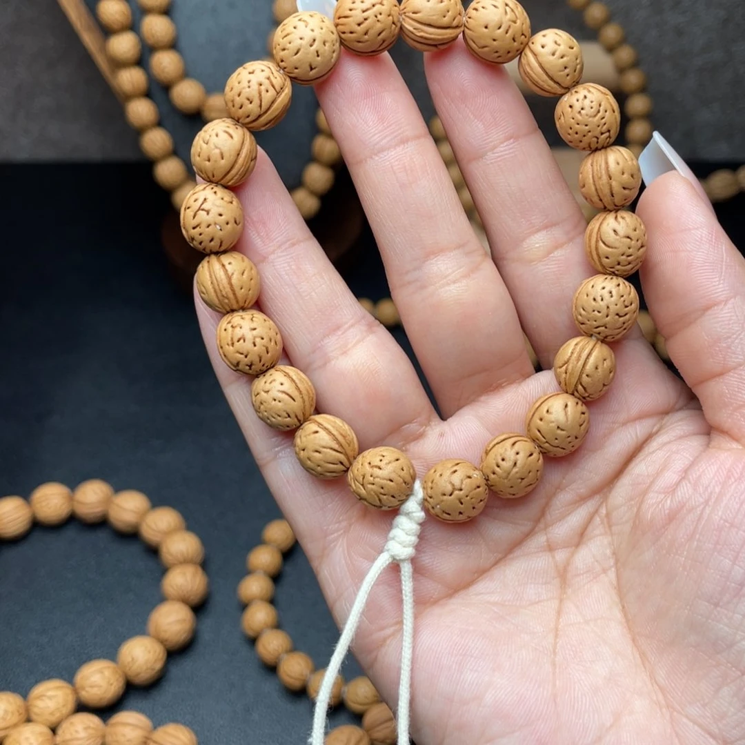 就****了10野生小金豆桃核手持