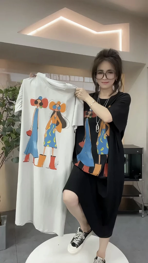 欧洲站2025年夏季新款时尚百搭宽松显瘦圆领卡通印花短袖连衣裙女