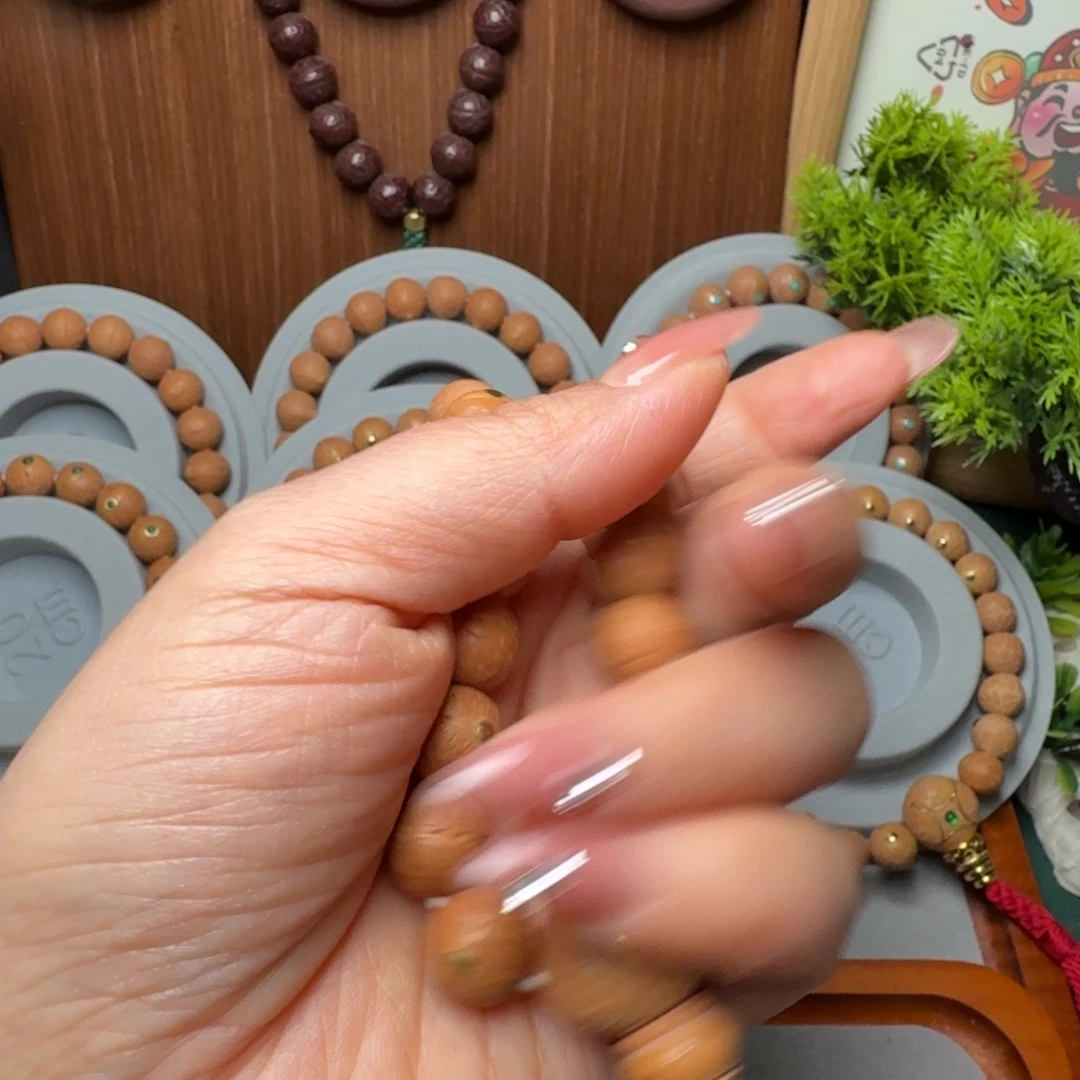 狮***王凤眼菩提手串尼泊尔凤眼镶嵌铜丁