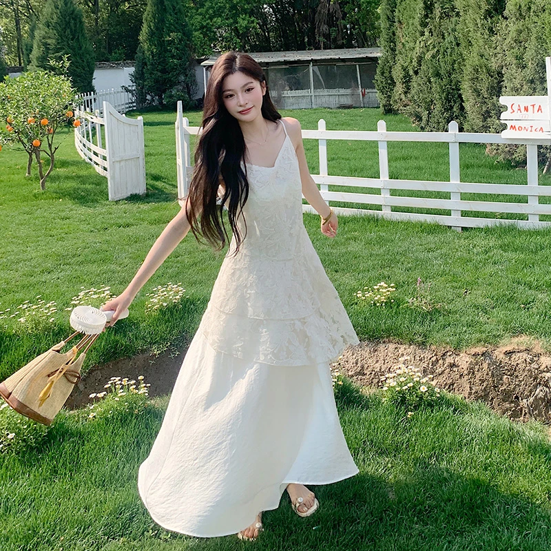 法式刺绣蕾丝不规则拼接吊带连衣裙女2025夏季新款超仙度假风长裙