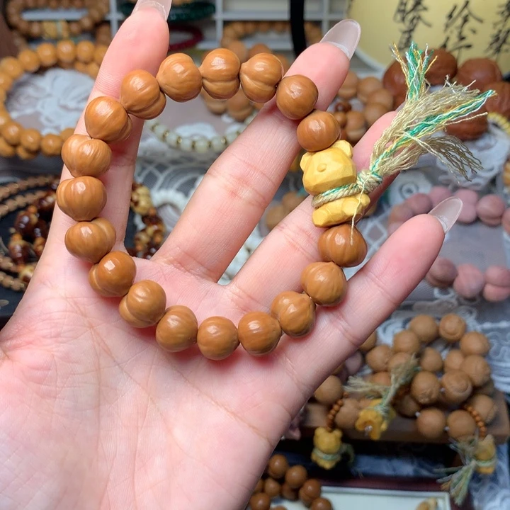 *****猴头核桃吊坠屁桃手串