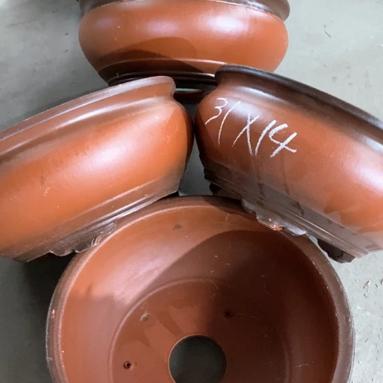 紫砂花盆100-4。     31-14