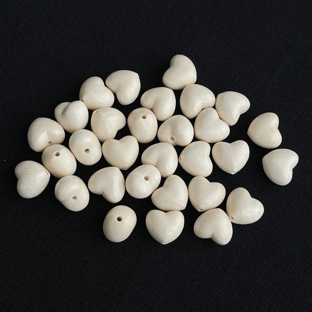 PD083 爱心珠 只做天然猛犸牙 尺寸约 对孔12*长度13*厚度10mm