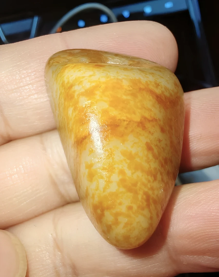 新疆和田原石手把件