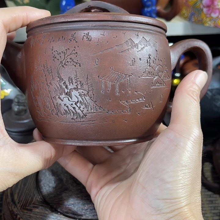 用***4茶壶紫泥原矿泥料手工制作的一把紫砂壶。