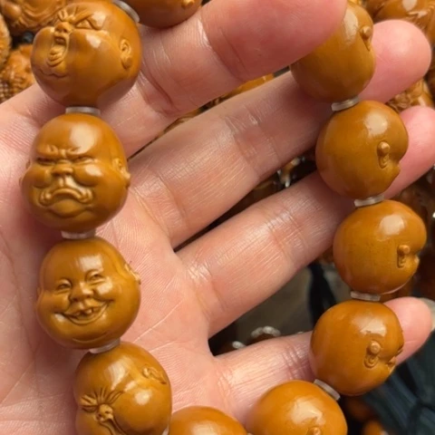 橄榄核雕人生百态